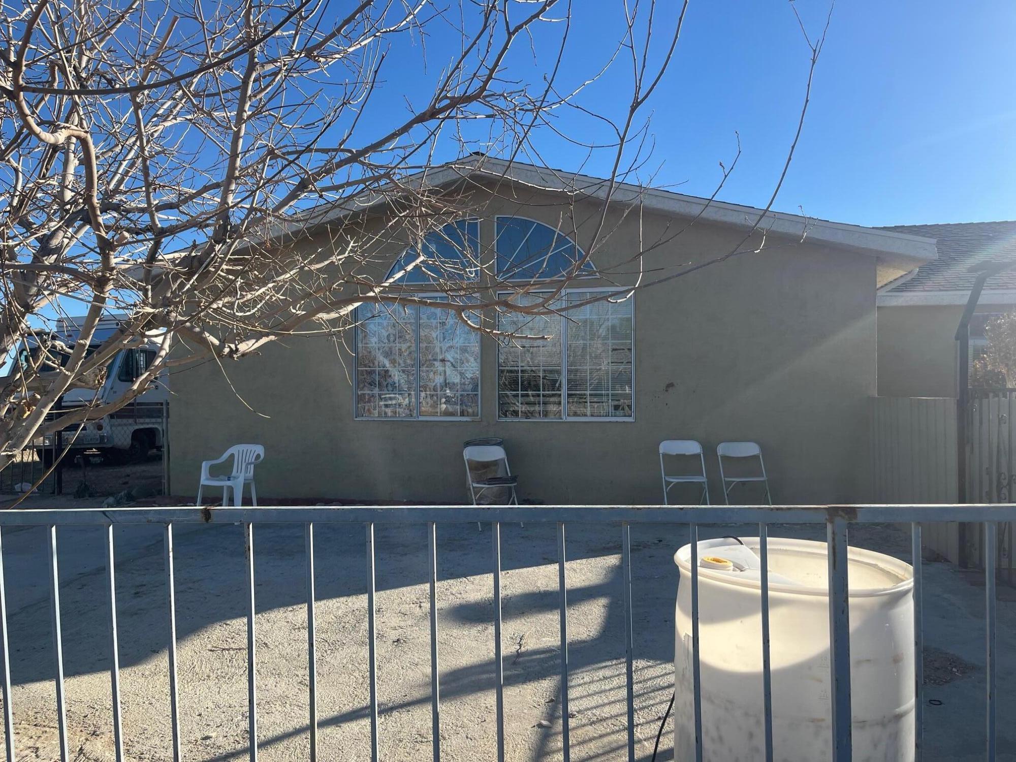 21925 Fort Tejon Road Llano, CA 93544 - Photo 10 of 10 a view of balcony with two window
