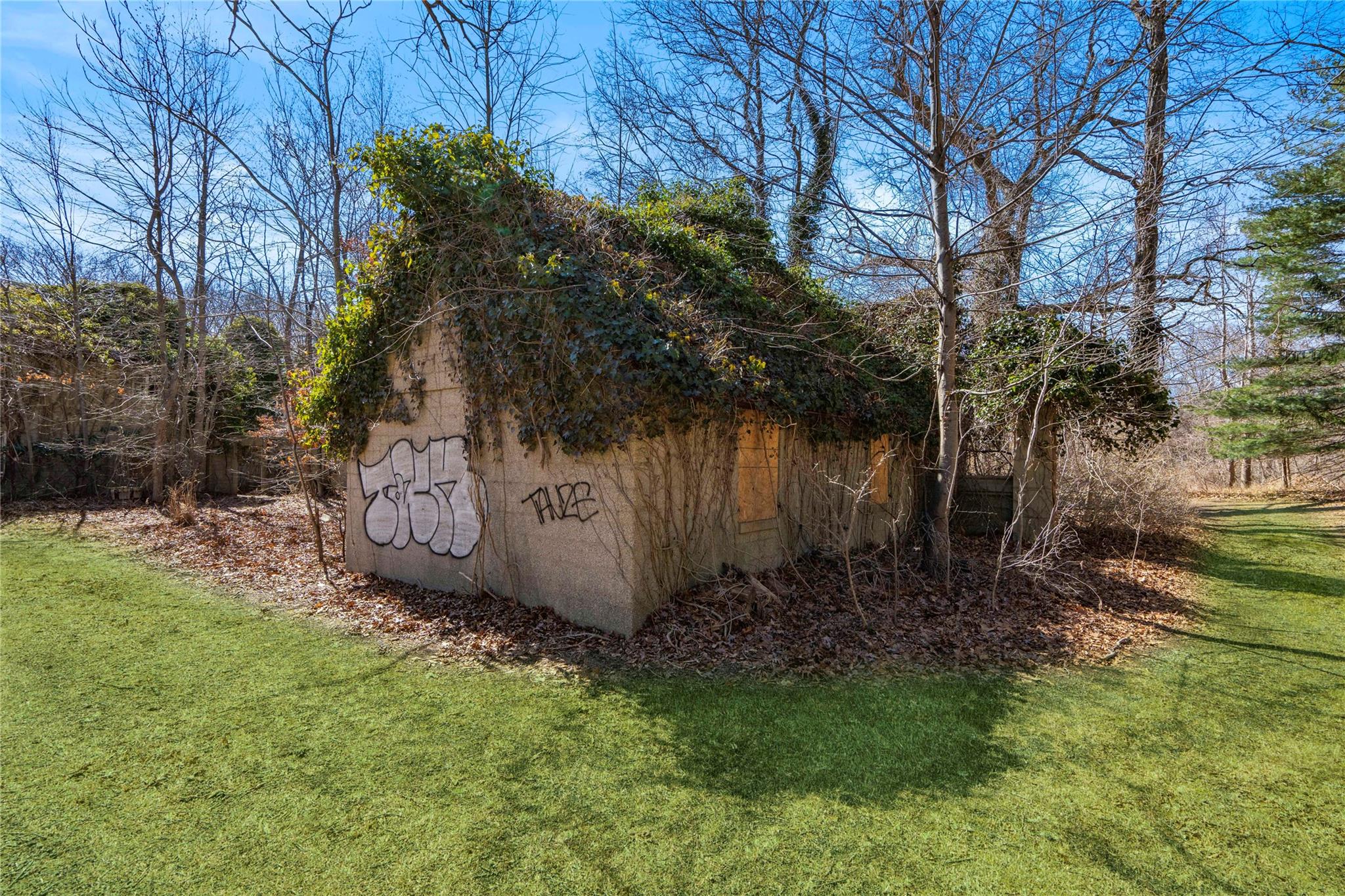 2340 Cedar Swamp Road Glen Head, NY 11545 - Photo 7 of 12 a view of a backyard of the house
