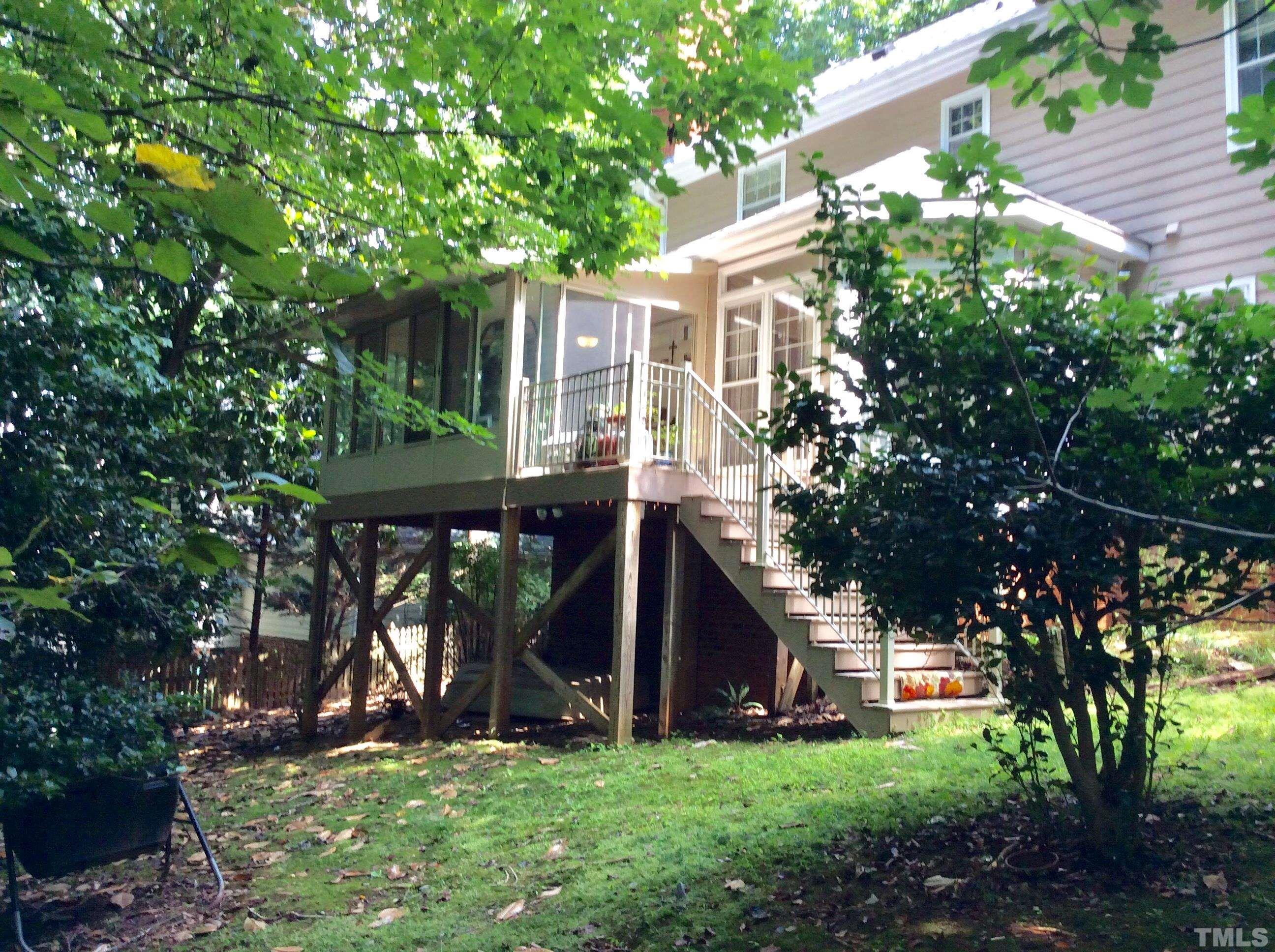 12105 Warwickshire Way Raleigh, NC 27613 - Photo 26 of 44 front view of a house with a tree
