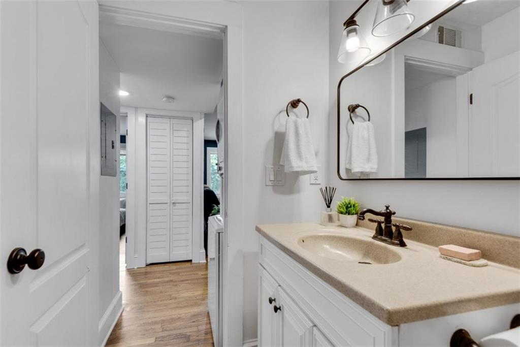 351 Cherokee Avenue Southeast, Unit 8 Atlanta, GA 30312 - Photo 16 of 28 a bathroom with a sink and a mirror