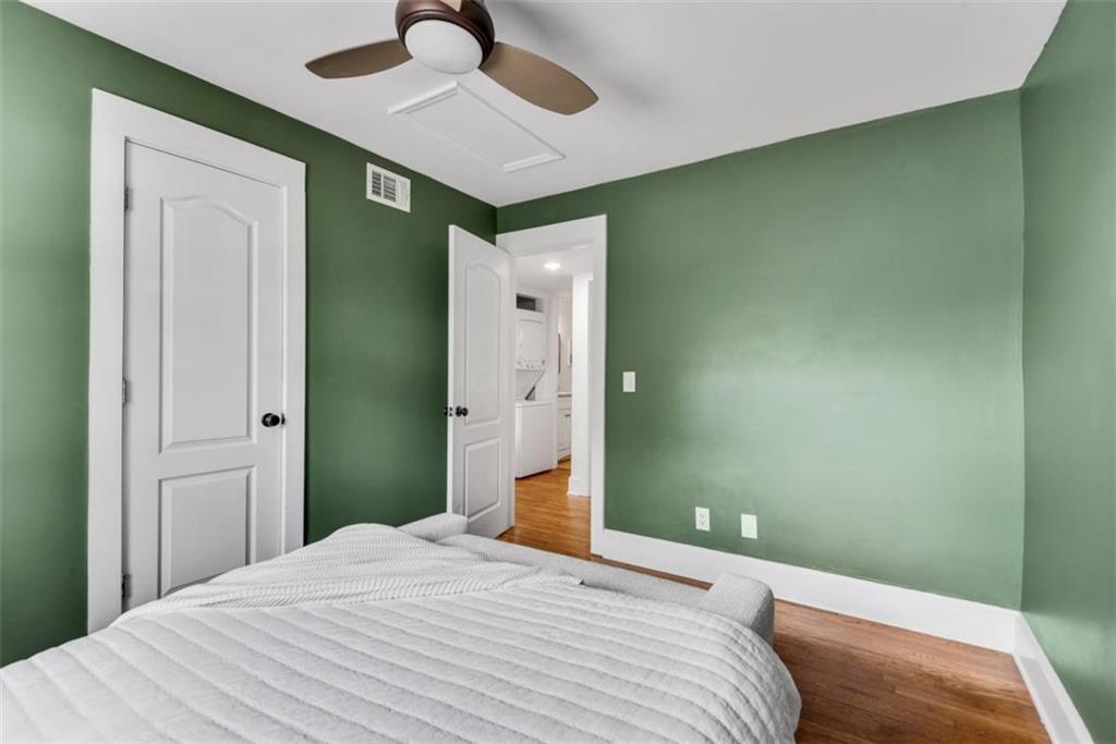 351 Cherokee Avenue Southeast, Unit 8 Atlanta, GA 30312 - Photo 20 of 28 a bedroom with a bed and a window