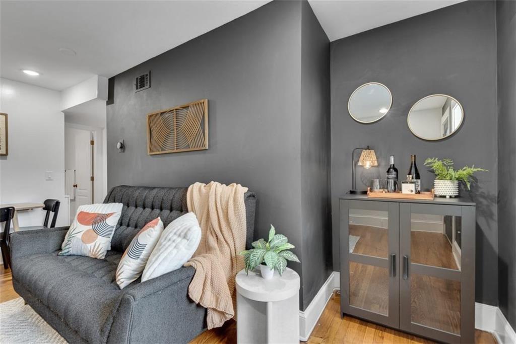 351 Cherokee Avenue Southeast, Unit 8 Atlanta, GA 30312 - Photo 5 of 28 a living room with furniture