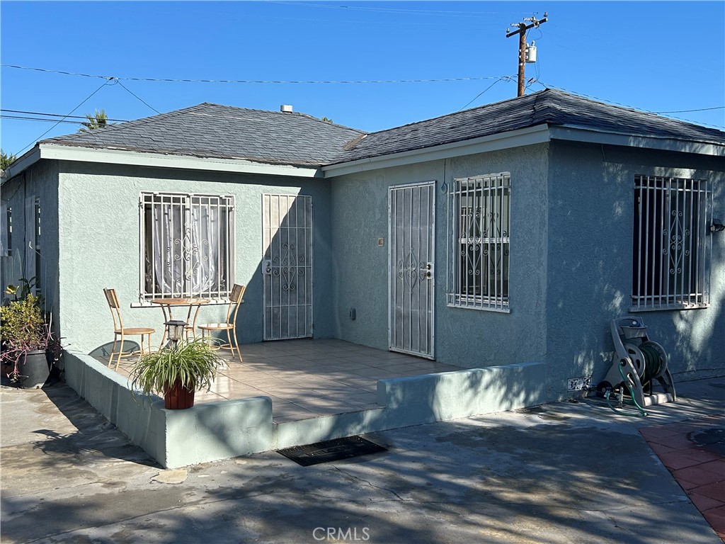 2011 East Elizabeth Street Compton, CA 90221 - Photo 2 of 19 a view of a house with wooden fence