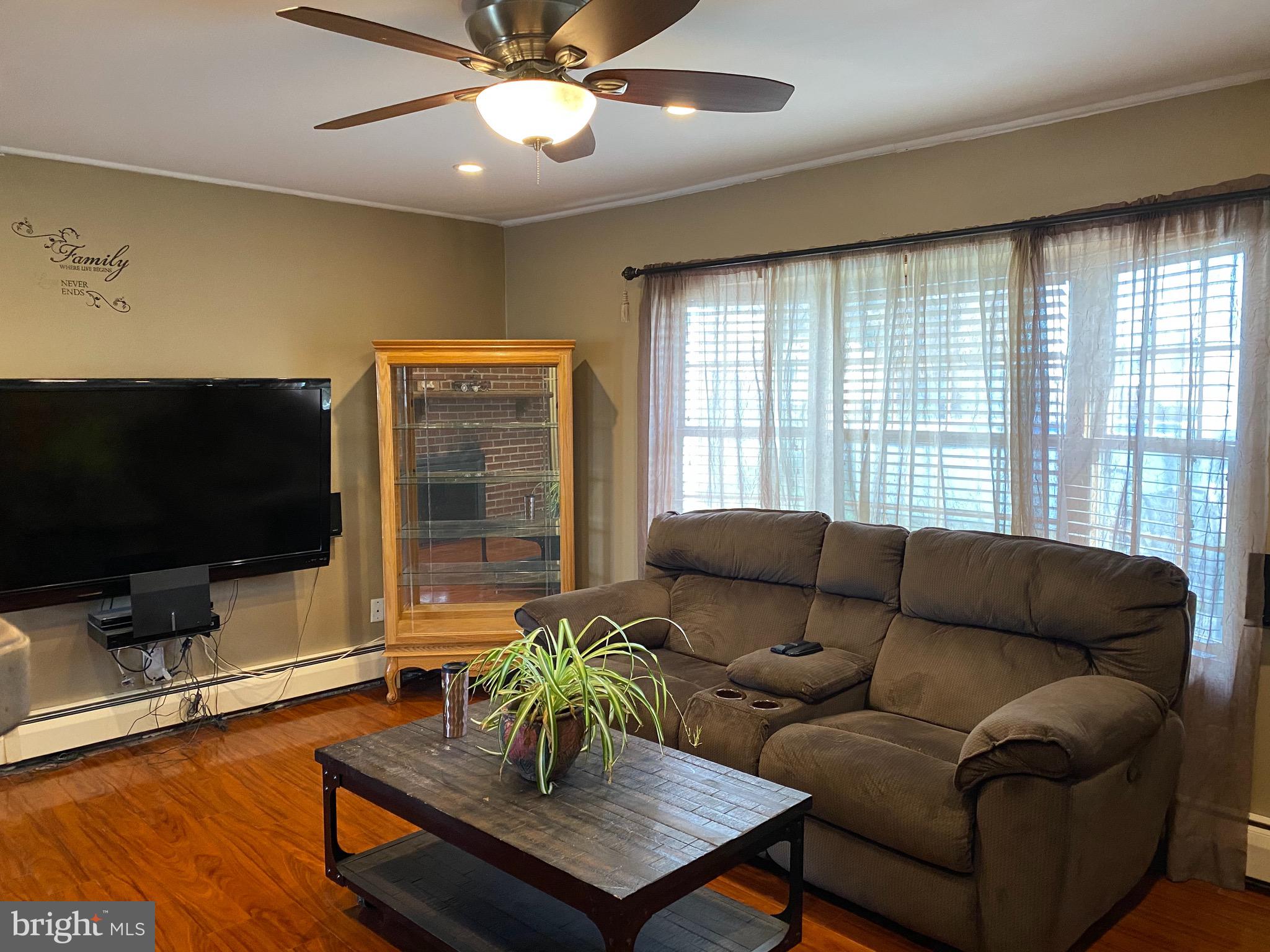 9209 Andover Road Philadelphia, PA 19114 - Photo 7 of 23 Large Living Room overlooking rear Yard.
