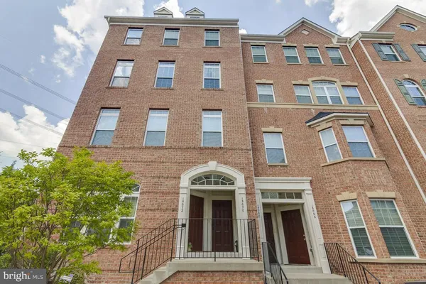 a bathroom with a tub and shower