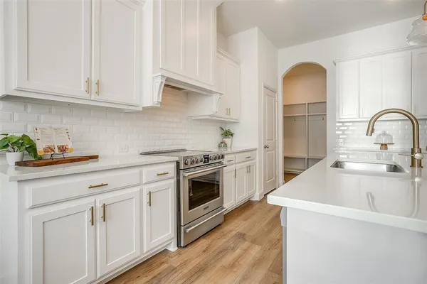 a bedroom with a bed and flat screen tv