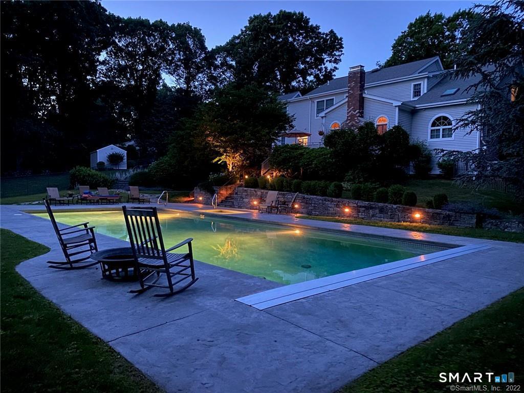 14 Cleft Rock Road Woodbridge, CT 06525 - Photo 36 of 40 pool at night with lights