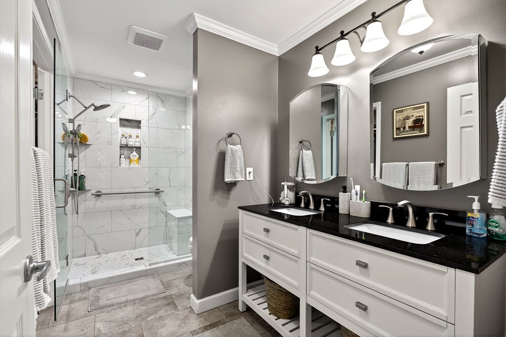 2195 Windle Community Road Cookeville, TN 38506 - Photo 13 of 22 a bathroom with a double vanity sink mirror double and shower