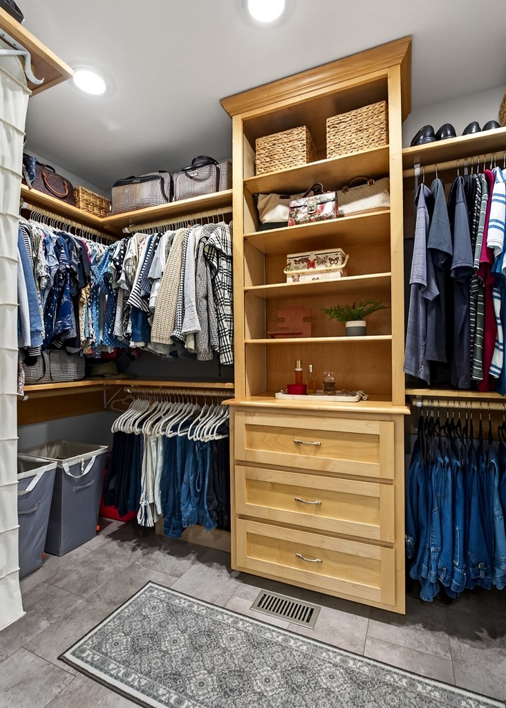 2195 Windle Community Road Cookeville, TN 38506 - Photo 15 of 22 a view of walk in closet with clothes and shoes
