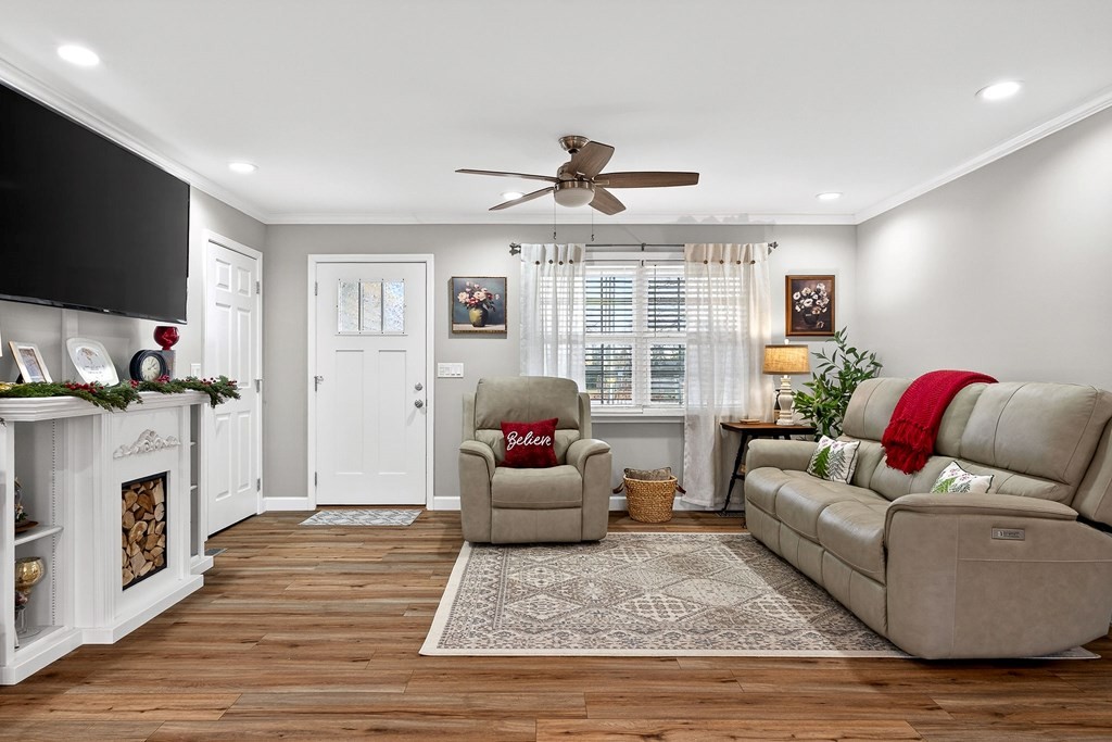 2195 Windle Community Road Cookeville, TN 38506 - Photo 4 of 22 a living room with furniture fireplace and flat screen tv