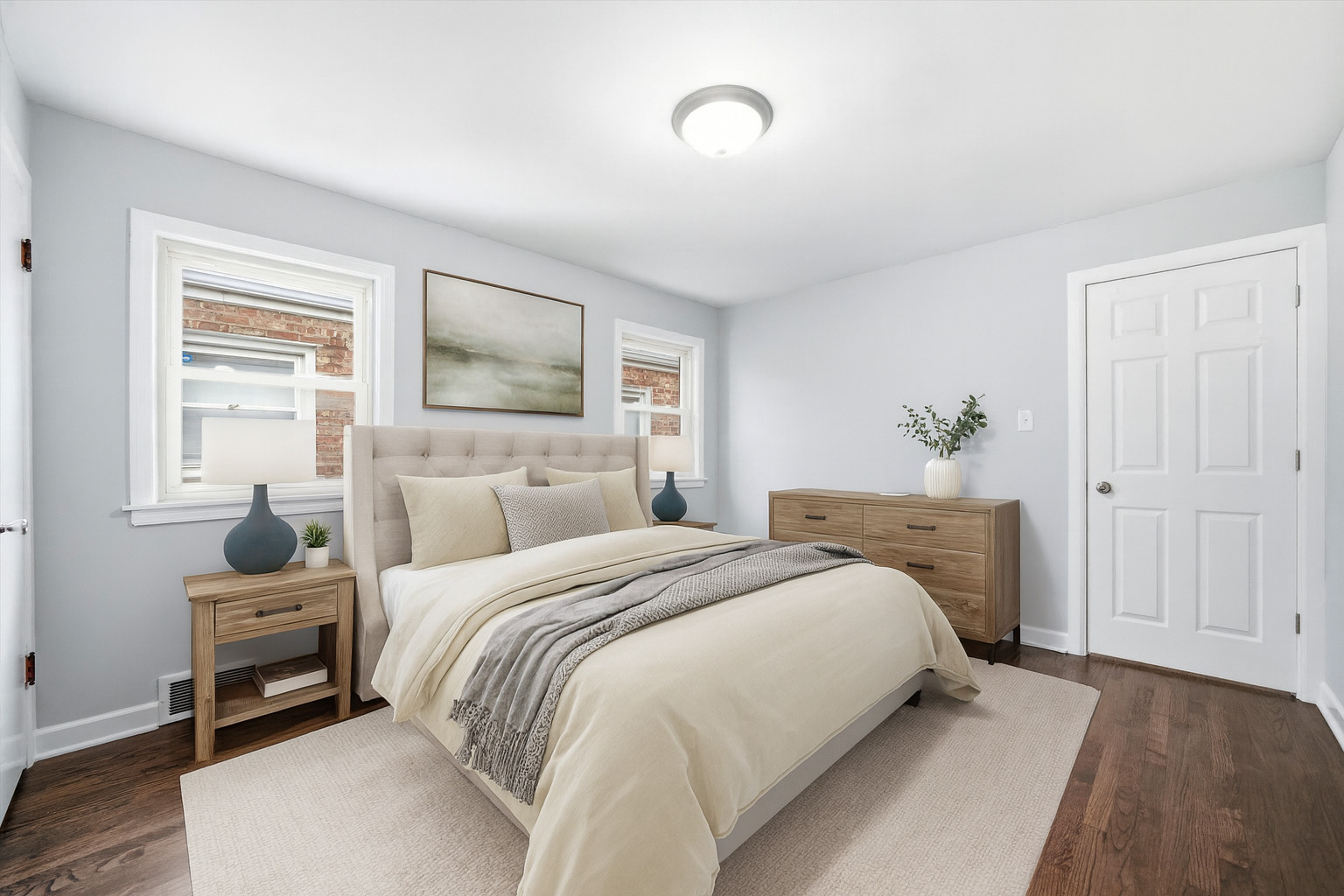 2658 West 83rd Street Chicago, IL 60652 - Photo 18 of 41 a bedroom with a bed and wooden floor