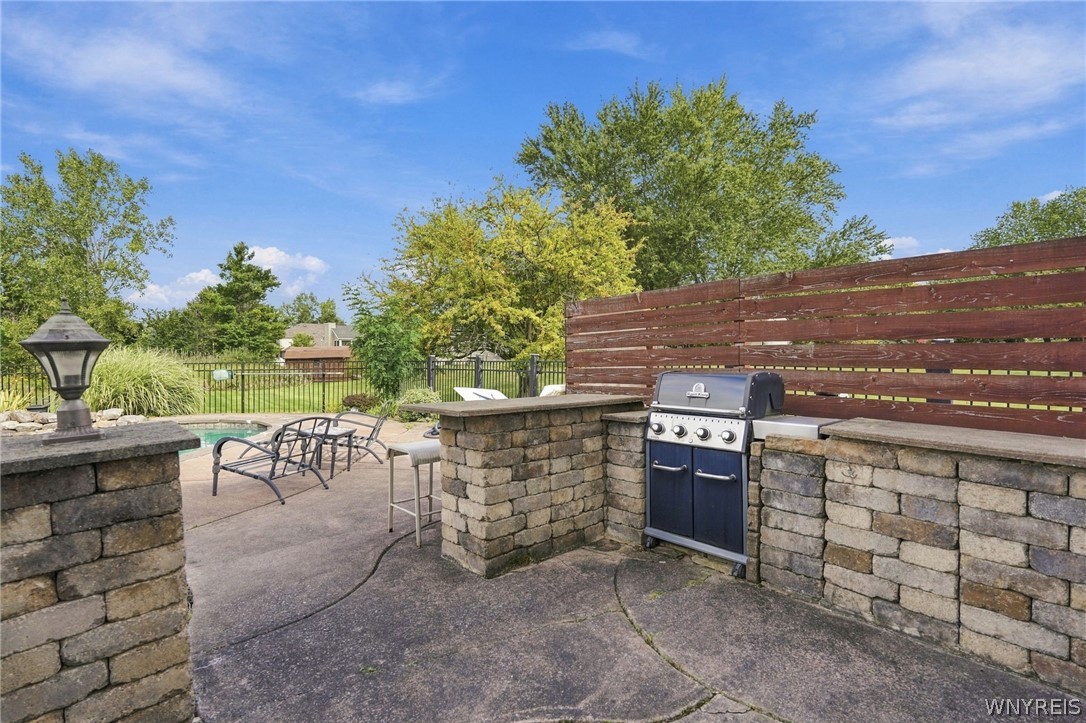 7526 Milestrip Road Orchard Park, NY 14127 - Photo 40 of 43 Outside kitchen