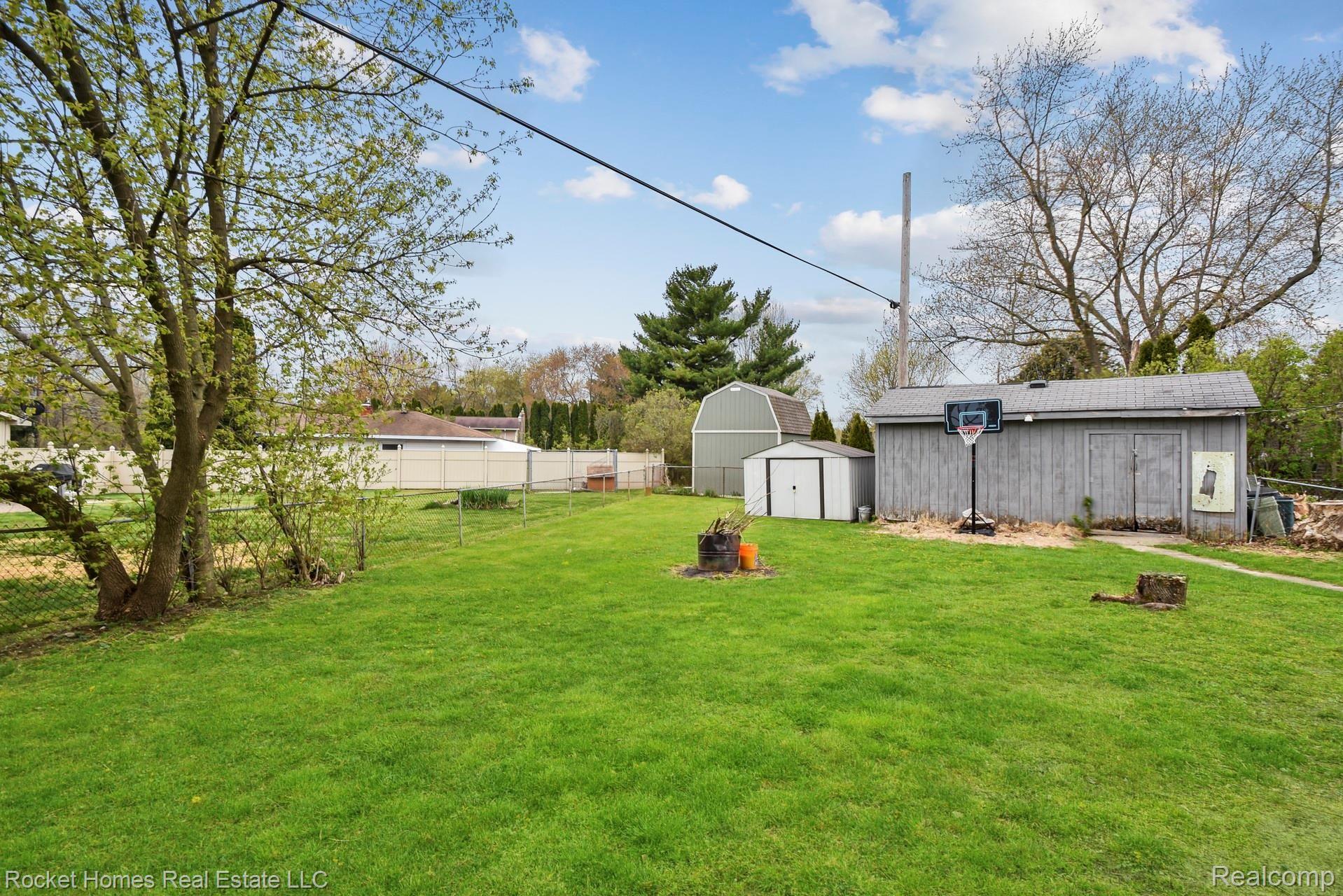 8561 Andersonville Road Clarkston, MI 48346 - Photo 28 of 34 027-photo-rear-view-8286494.jpg
