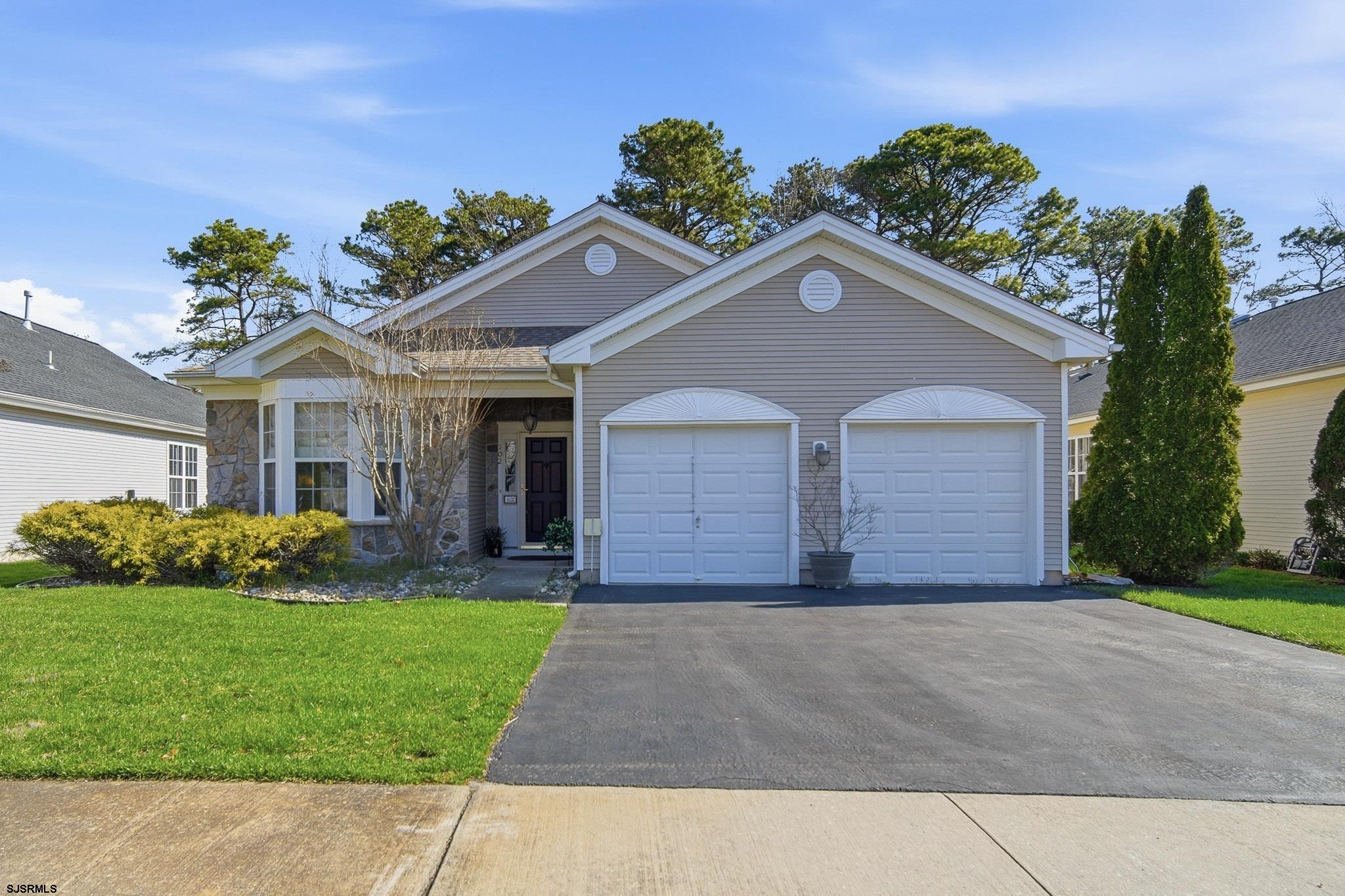 102 Warwick Road Galloway Township, NJ 08205 - Photo 1 of 45 a front view of house with yard and green space