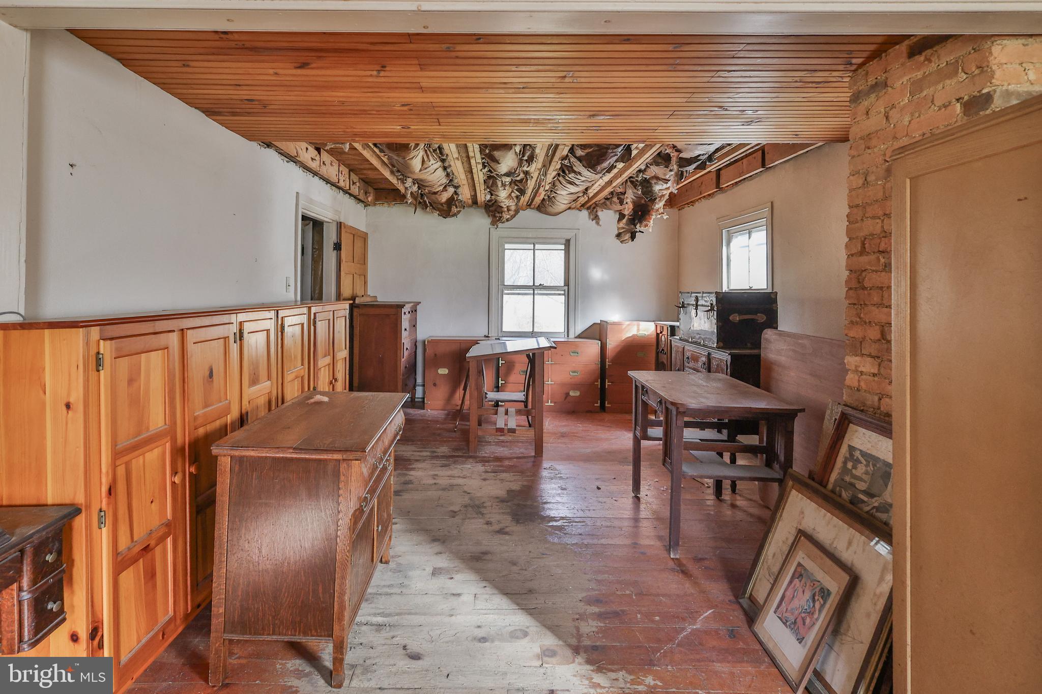 8659 Allemaengel Road Kempton, PA 19529 - Photo 17 of 71 a view of a livingroom with furniture window and wooden floor