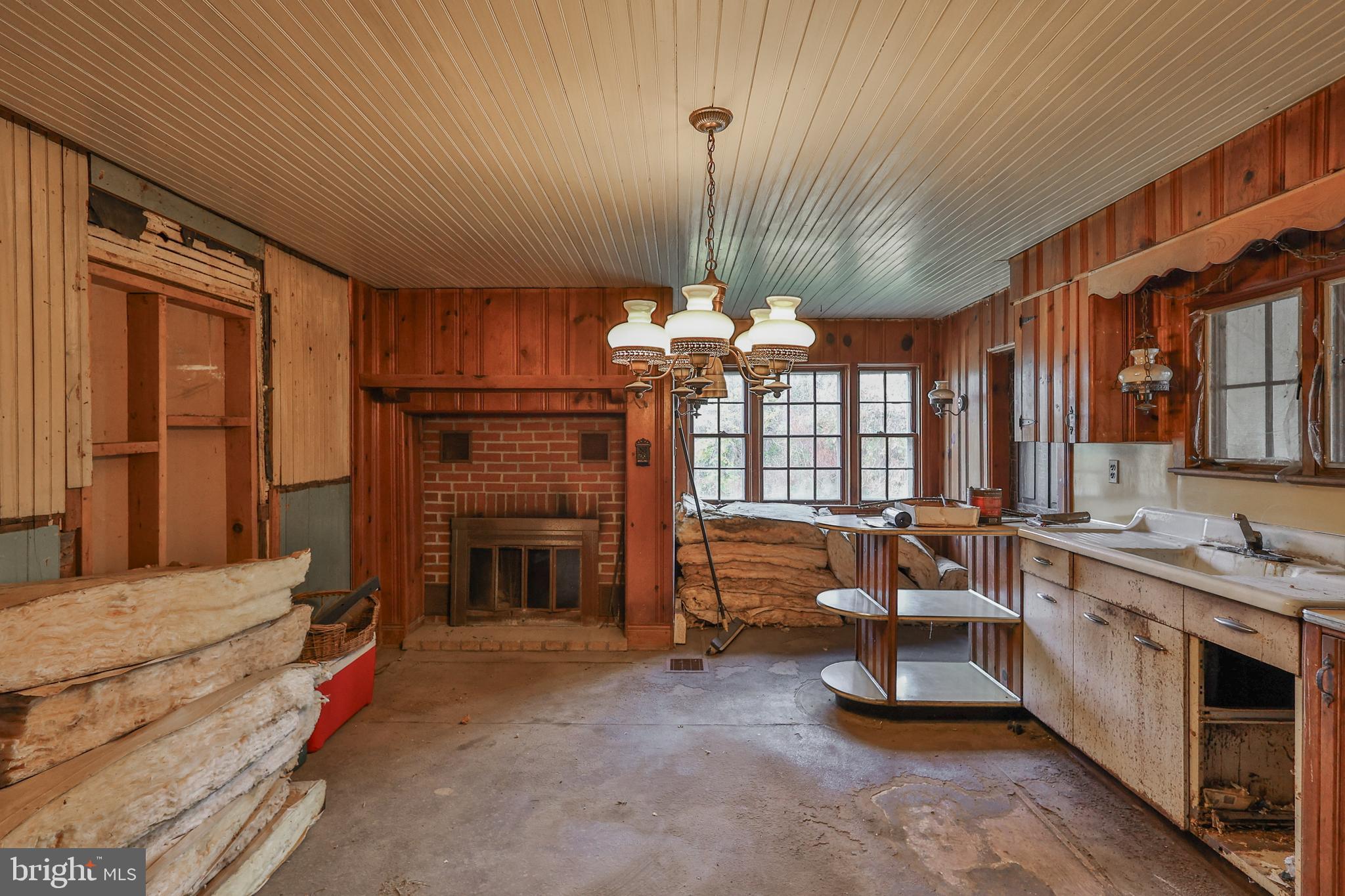 8659 Allemaengel Road Kempton, PA 19529 - Photo 24 of 71 a spacious bedroom with bed and a chandelier