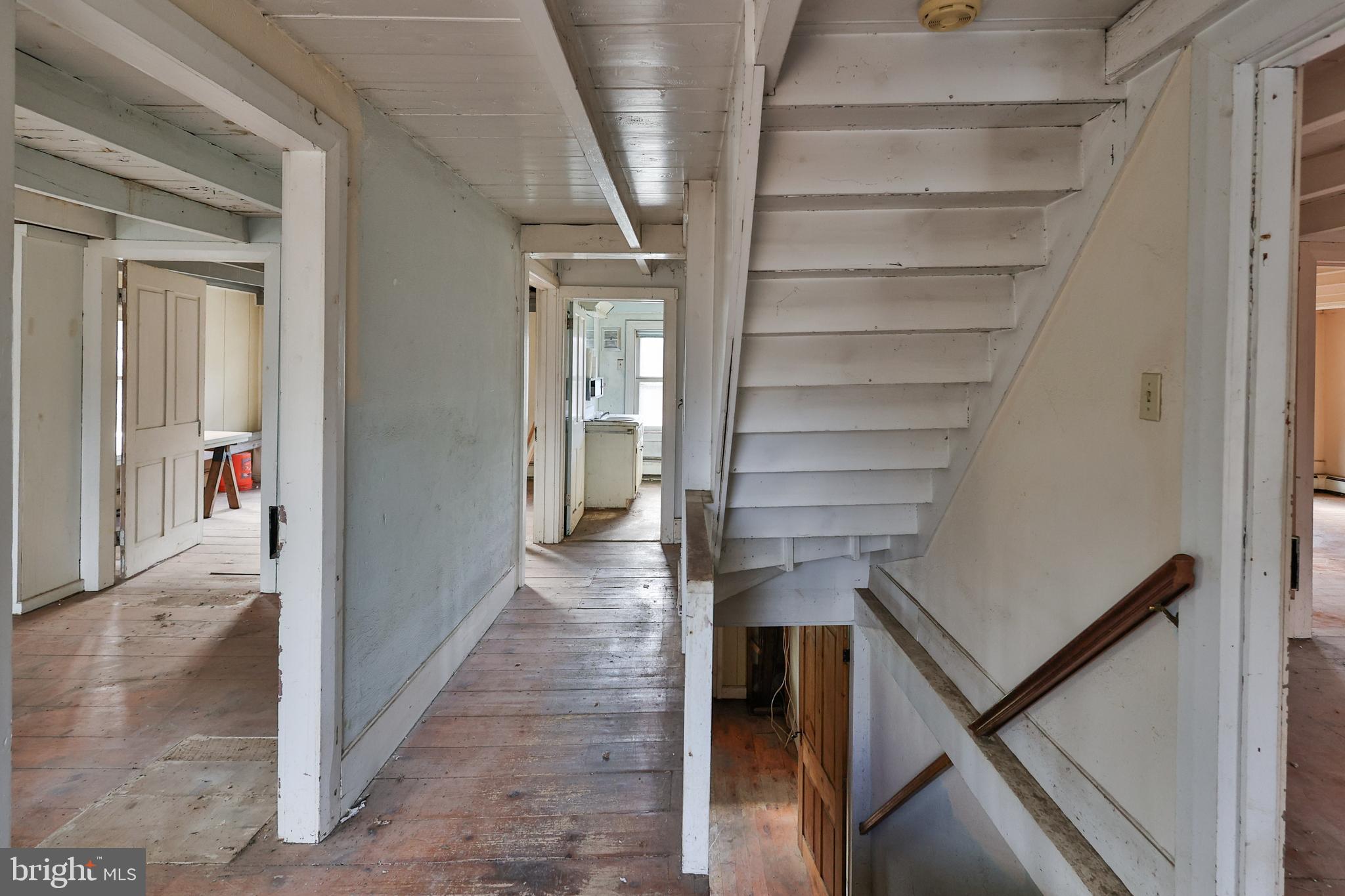 8659 Allemaengel Road Kempton, PA 19529 - Photo 35 of 71 a view of entryway and hall with wooden floor