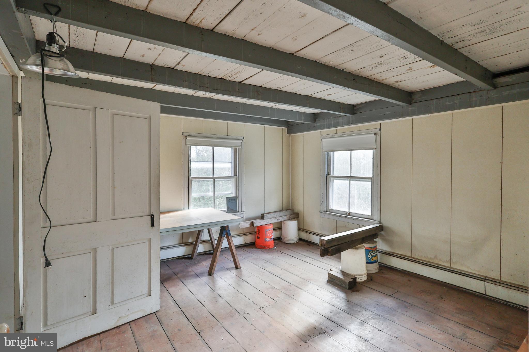 8659 Allemaengel Road Kempton, PA 19529 - Photo 37 of 71 a living room with furniture a window and wooden floor