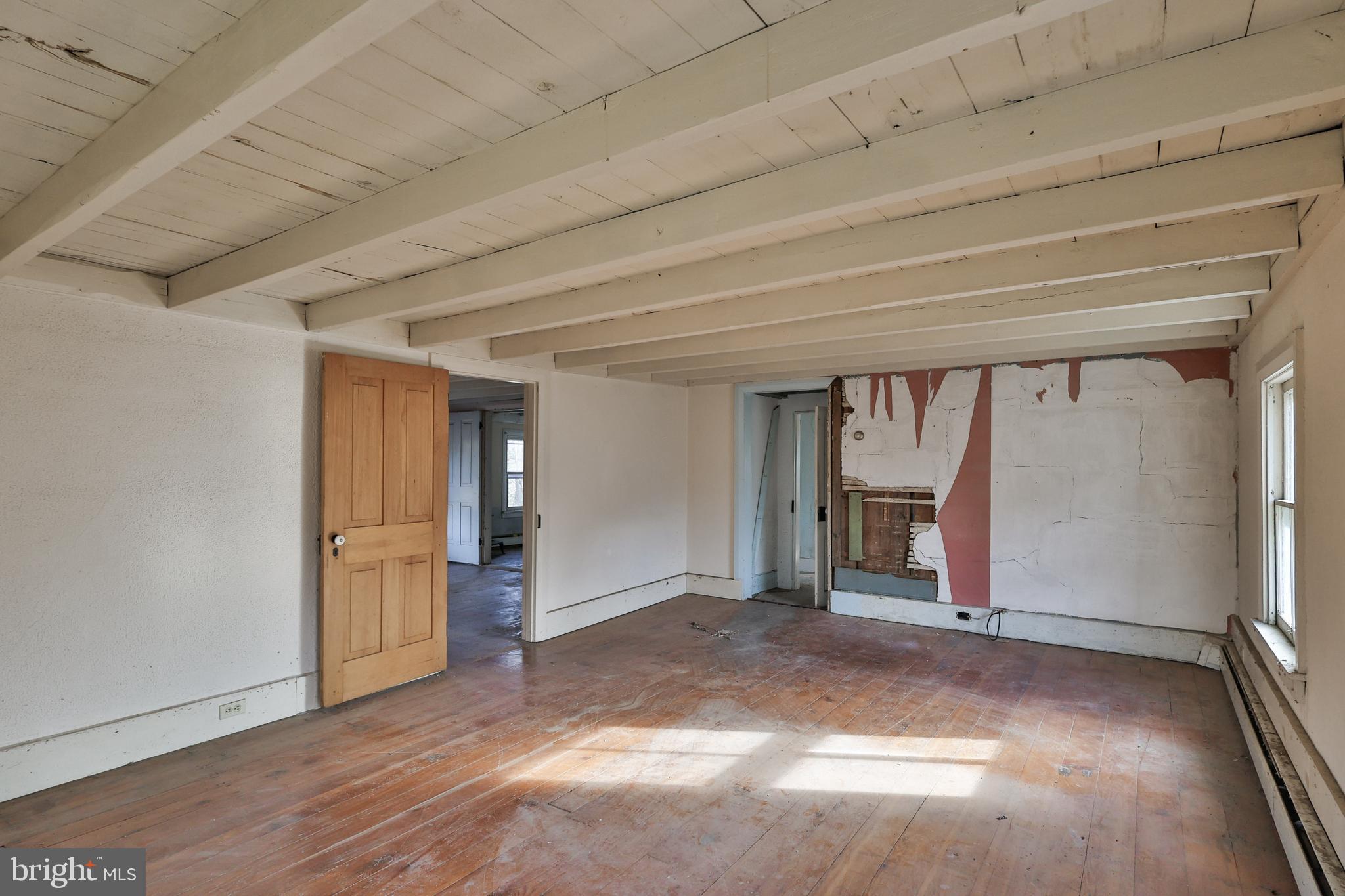 8659 Allemaengel Road Kempton, PA 19529 - Photo 57 of 71 a view of empty room with wooden floor