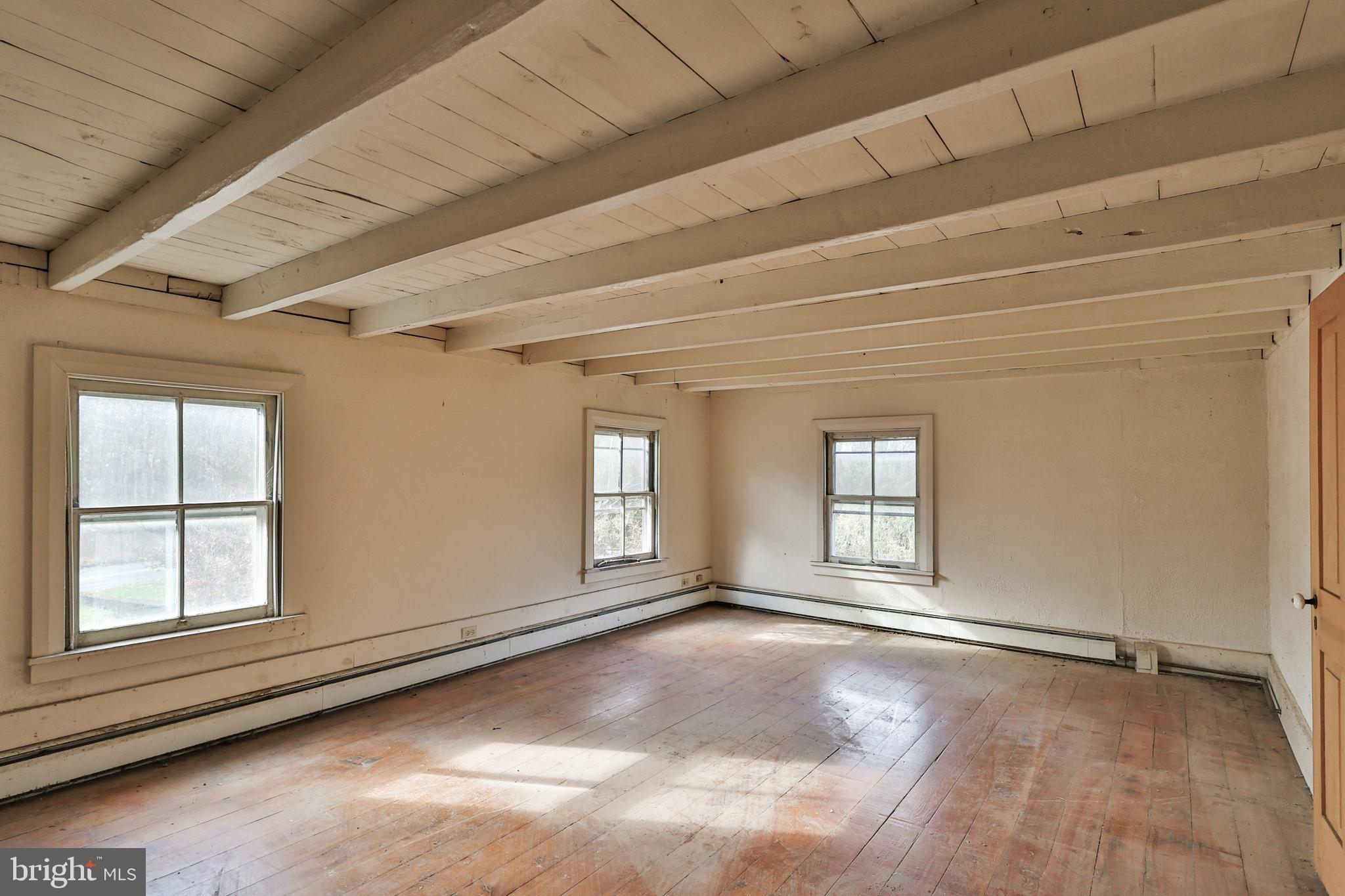8659 Allemaengel Road Kempton, PA 19529 - Photo 60 of 71 a view of an empty room with a window