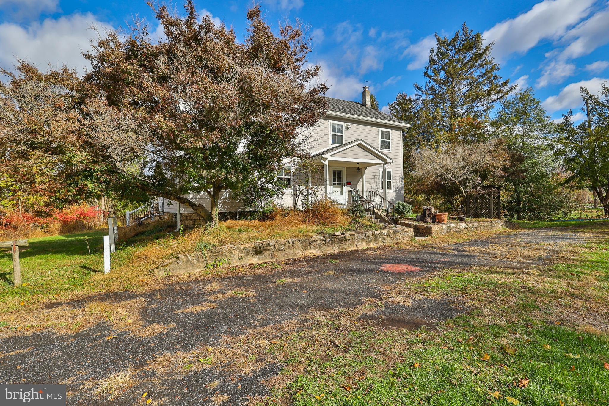 8659 Allemaengel Road Kempton, PA 19529 - Photo 6 of 71 a front view of a house with a yard