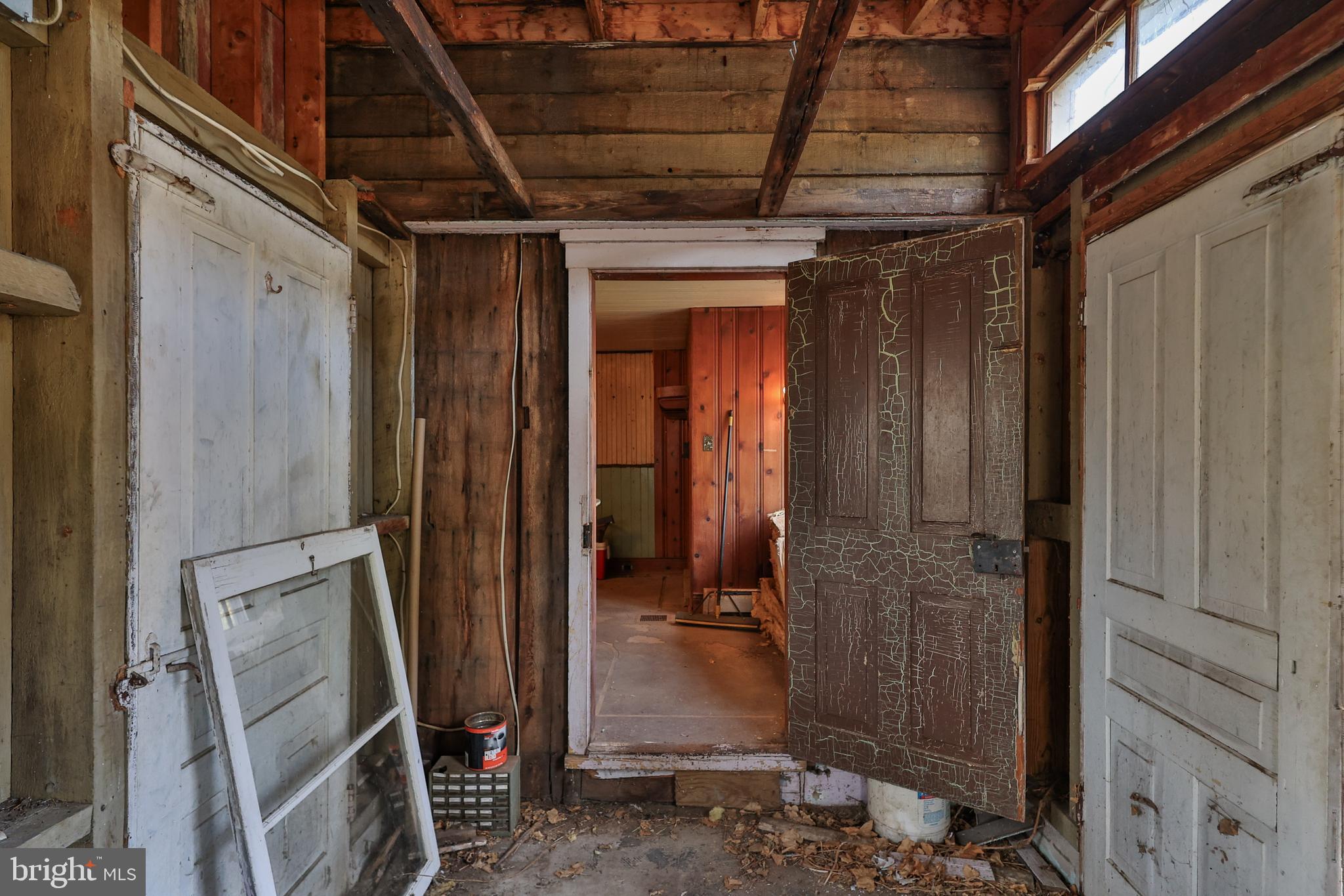 8659 Allemaengel Road Kempton, PA 19529 - Photo 65 of 71 a view of a hallway with wooden walls