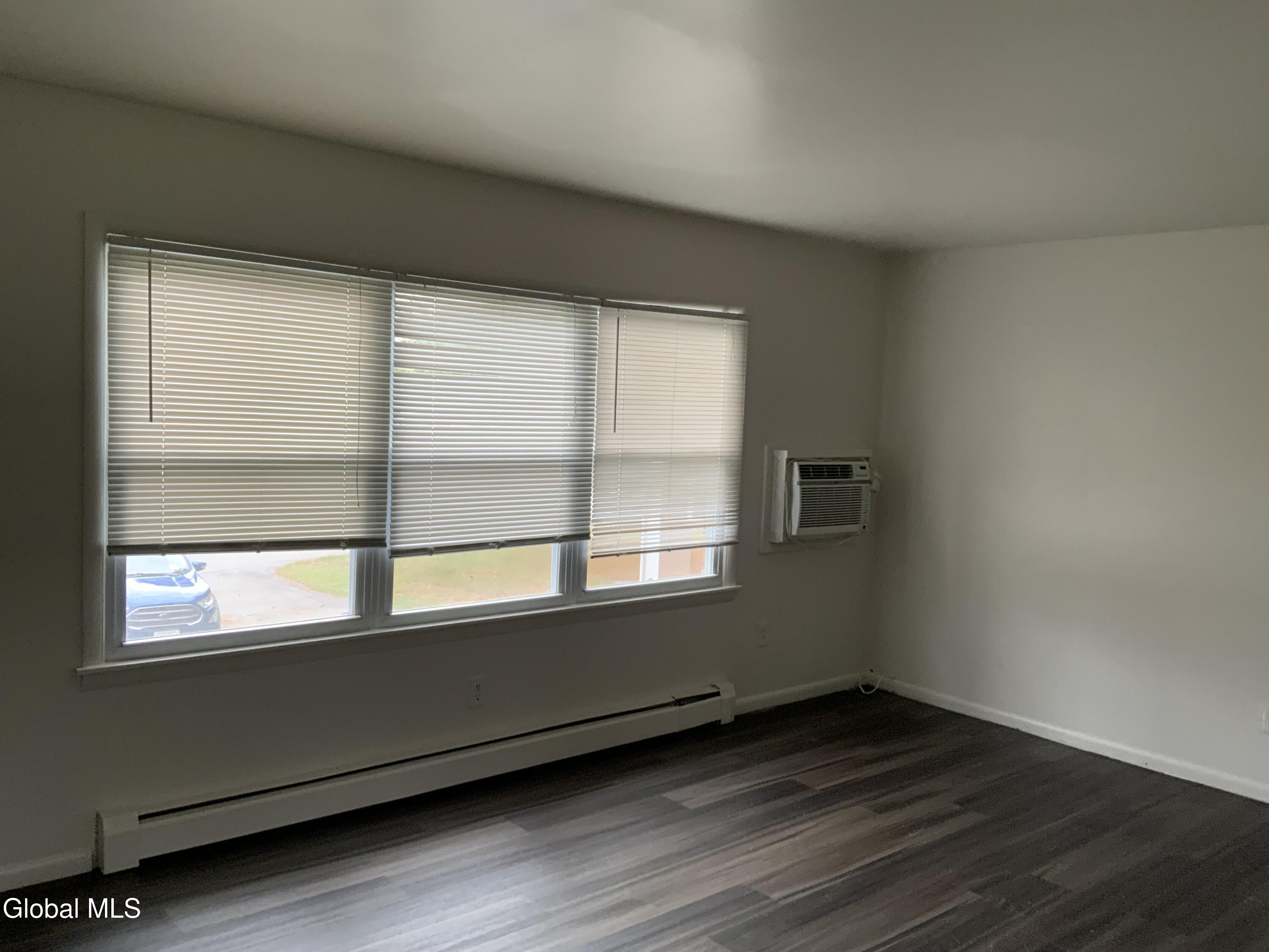 11-21 Ashdown Road, Unit 15C Clifton Park, NY 12019 - Photo 2 of 16 Living Room