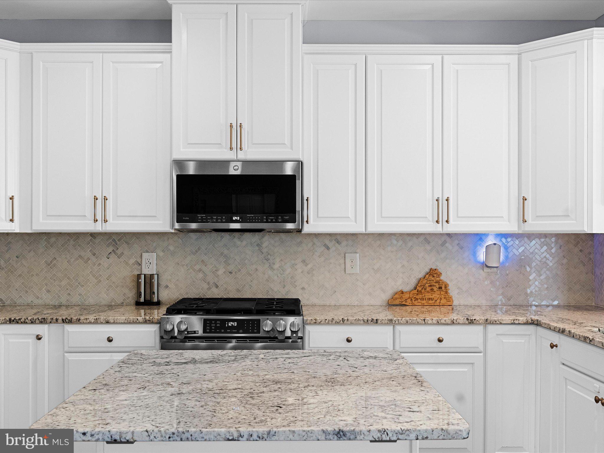 2381 Jersey Pine Ridge Charlottesville, VA 22911 - Photo 19 of 72 Sleek modern kitchen with granite accents.