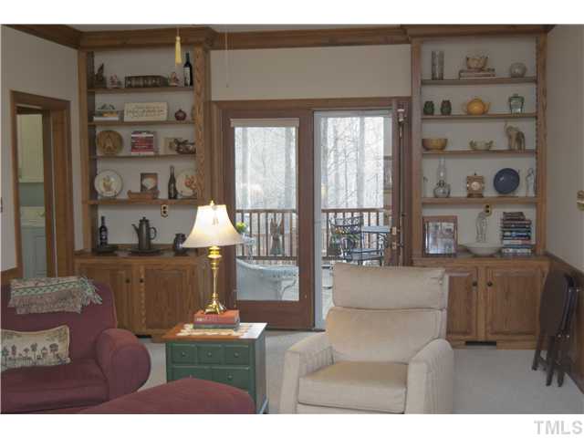10300 Whitestone Road Raleigh, NC 27615 - Photo 4 of 25 Pretty built in bookshelves in family room