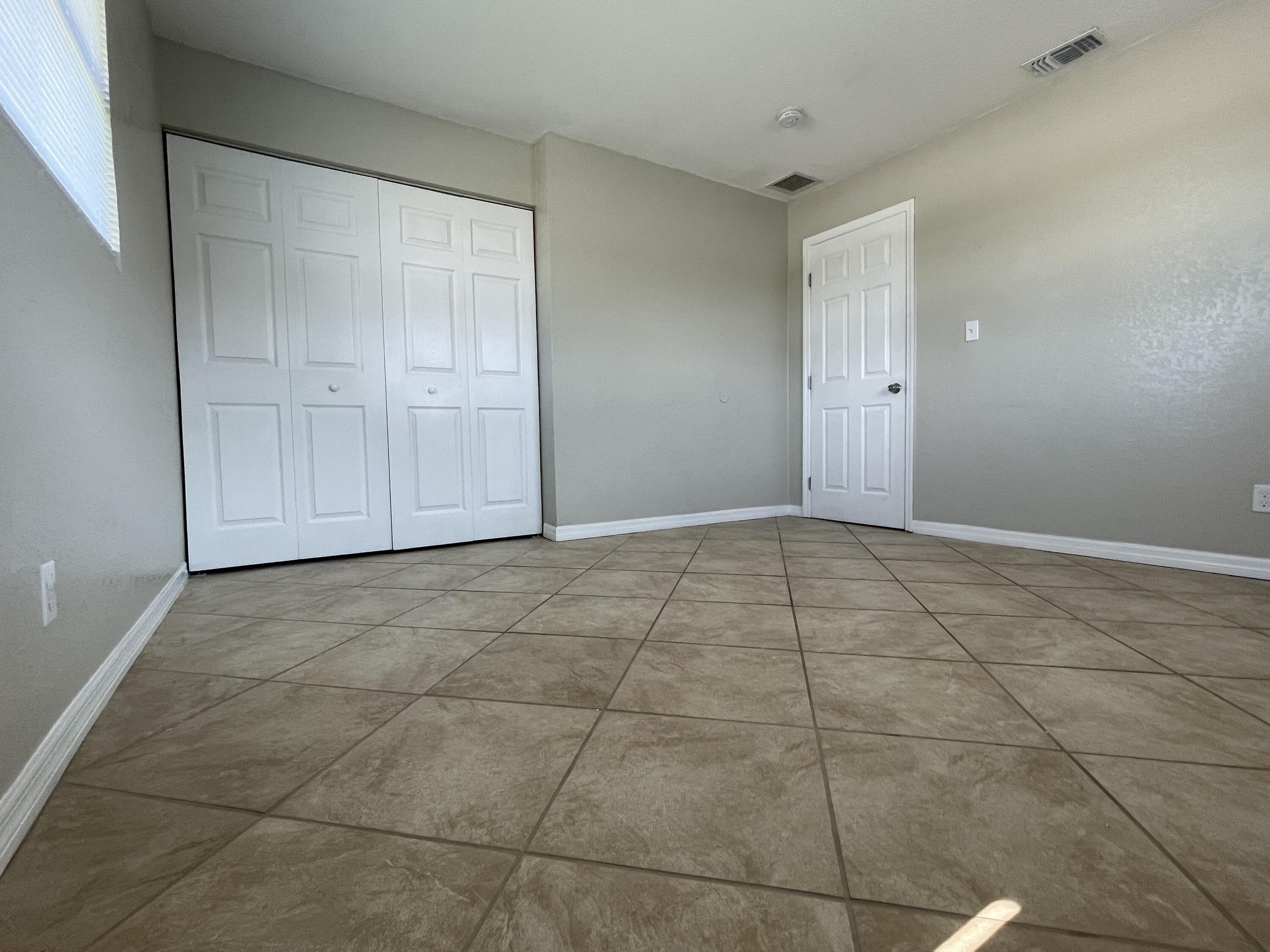 2880 Harson Way Fort Pierce, FL 34946 - Photo 27 of 40 a view of an empty room