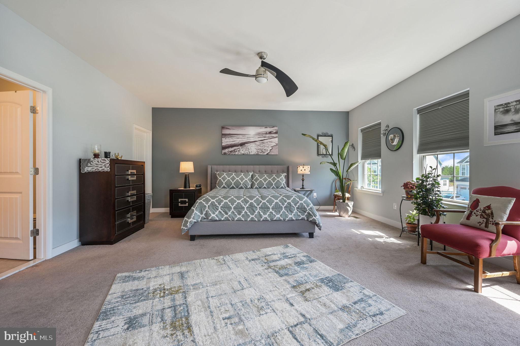 275 Mingo Way Townsend, DE 19734 - Photo 14 of 23 a bedroom with a large bed and a couch