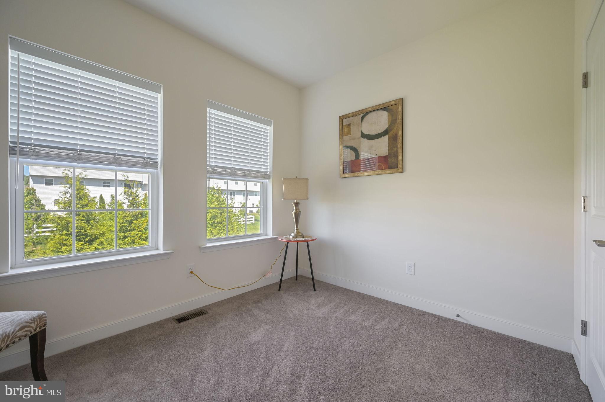 275 Mingo Way Townsend, DE 19734 - Photo 18 of 23 a view of an empty room with a window