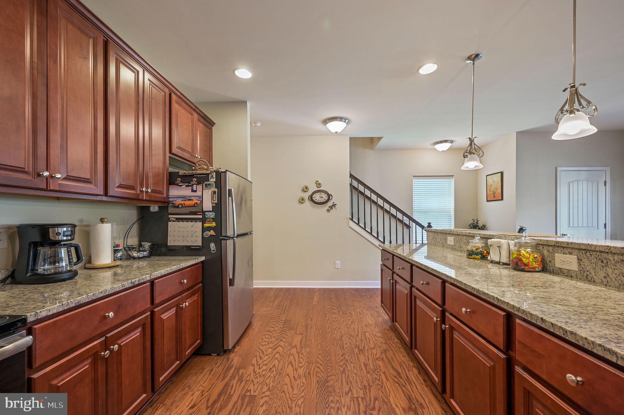 275 Mingo Way Townsend, DE 19734 - Photo 6 of 23 a kitchen with sink cabinets and stove