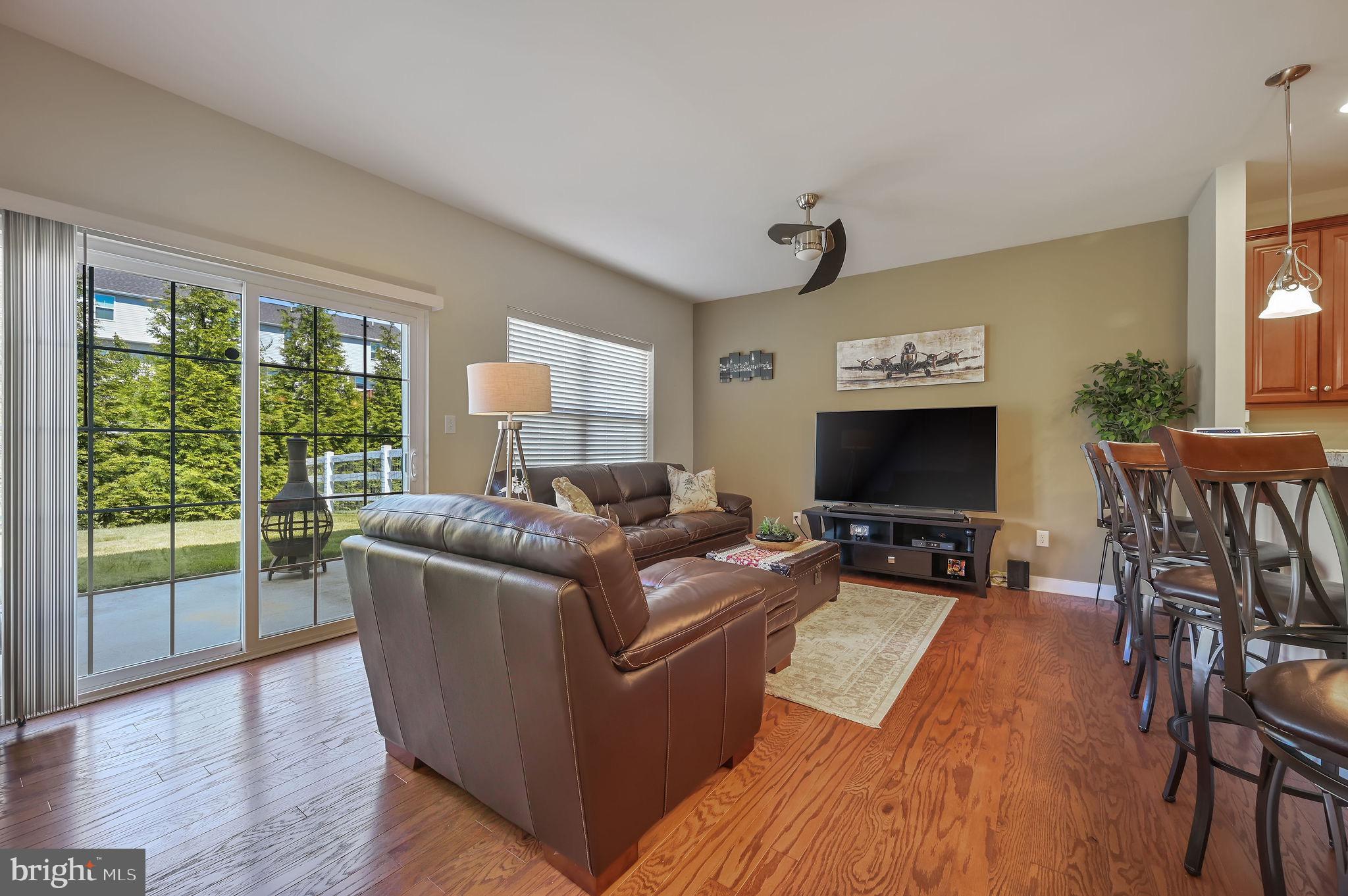 275 Mingo Way Townsend, DE 19734 - Photo 7 of 23 a living room with furniture and a flat screen tv