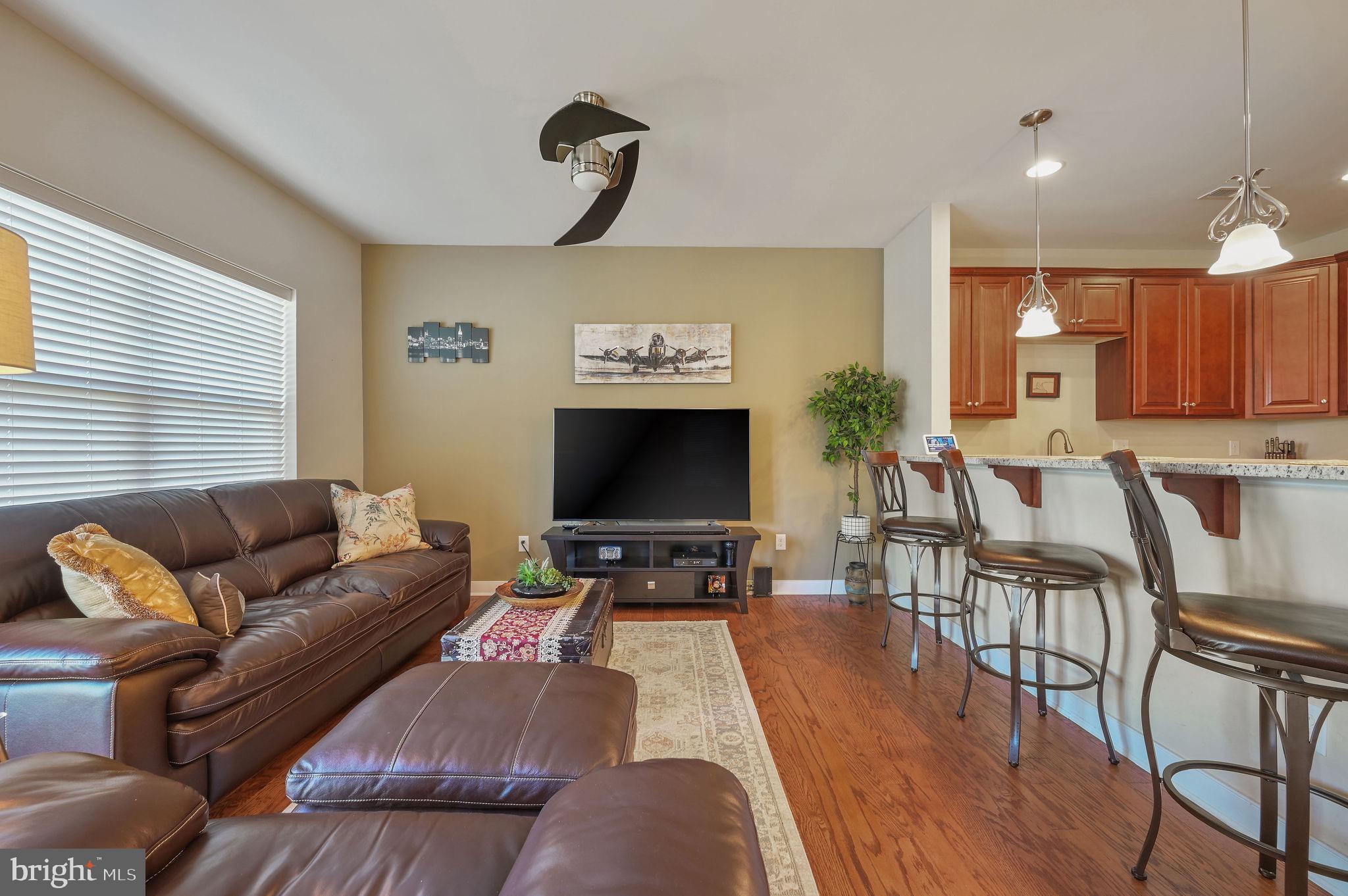 275 Mingo Way Townsend, DE 19734 - Photo 8 of 23 a living room with furniture and a flat screen tv