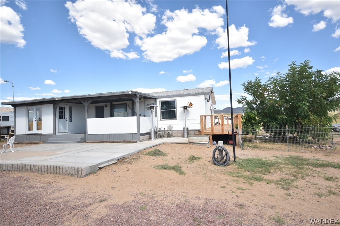 a front view of a house with a patio
