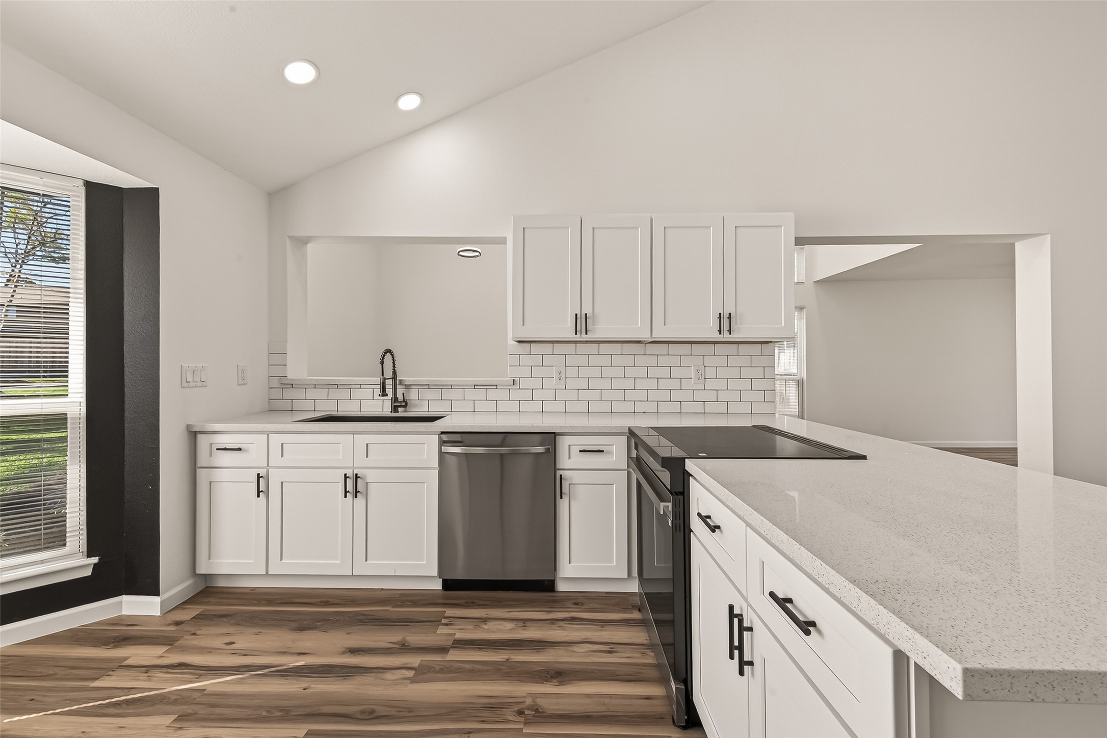 2915 Whispering Springs Drive Spring, TX 77373 - Photo 16 of 36 Spacious kitchen with ample cabinet storage and open layout to main living areas.