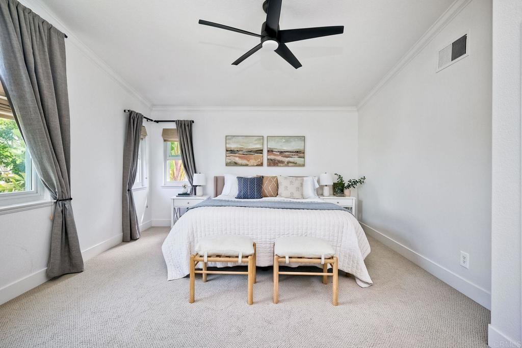 1054 Lighthouse Road Carlsbad, CA 92011 - Photo 16 of 44 a bed sitting in a bedroom next to a window