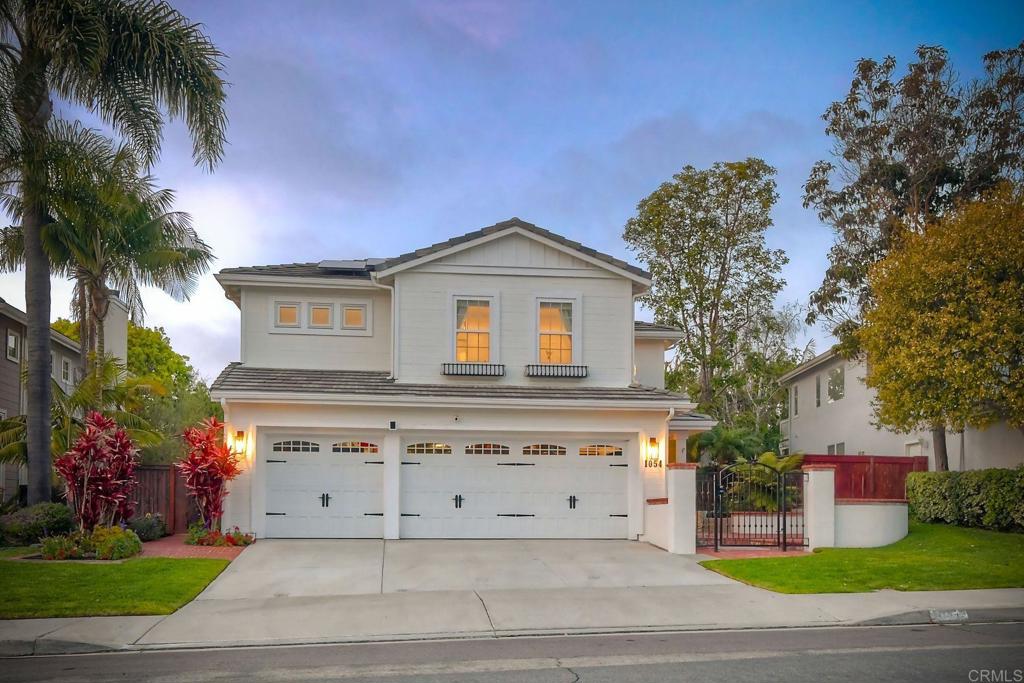 1054 Lighthouse Road Carlsbad, CA 92011 - Photo 2 of 44 a front view of house with yard and green space
