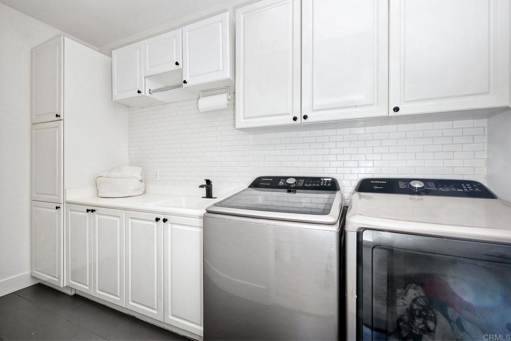 1054 Lighthouse Road Carlsbad, CA 92011 - Photo 23 of 44 a utility room with dryer and washer