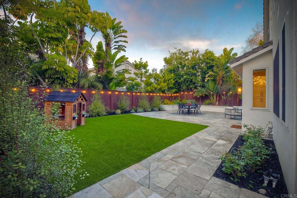 1054 Lighthouse Road Carlsbad, CA 92011 - Photo 29 of 44 a view of a garden with patio