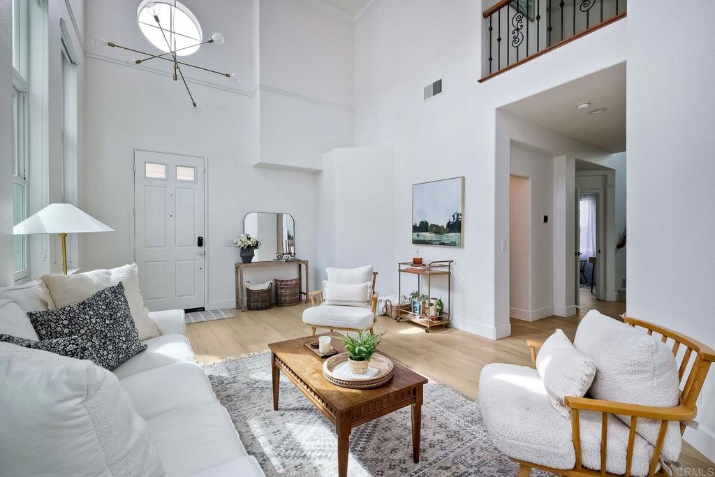 1054 Lighthouse Road Carlsbad, CA 92011 - Photo 7 of 44 a living room with furniture and a table