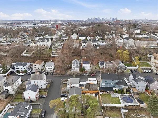an aerial view of a city with lots of residential buildings