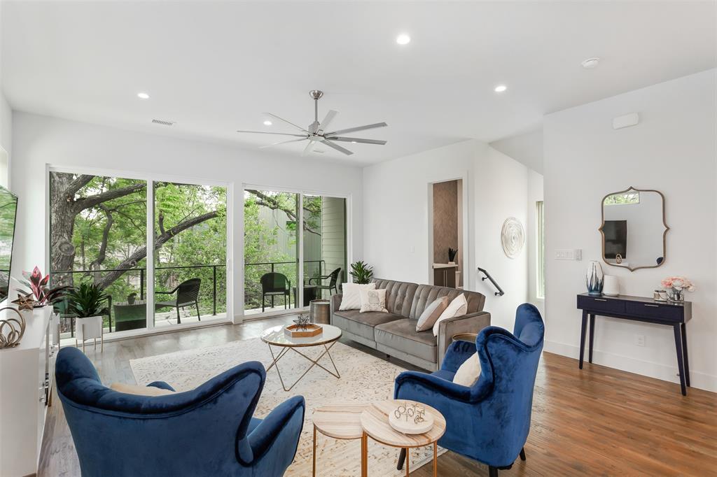 4425 Rusk Avenue Dallas, TX 75204 - Photo 3 of 19 a living room with furniture and a large window