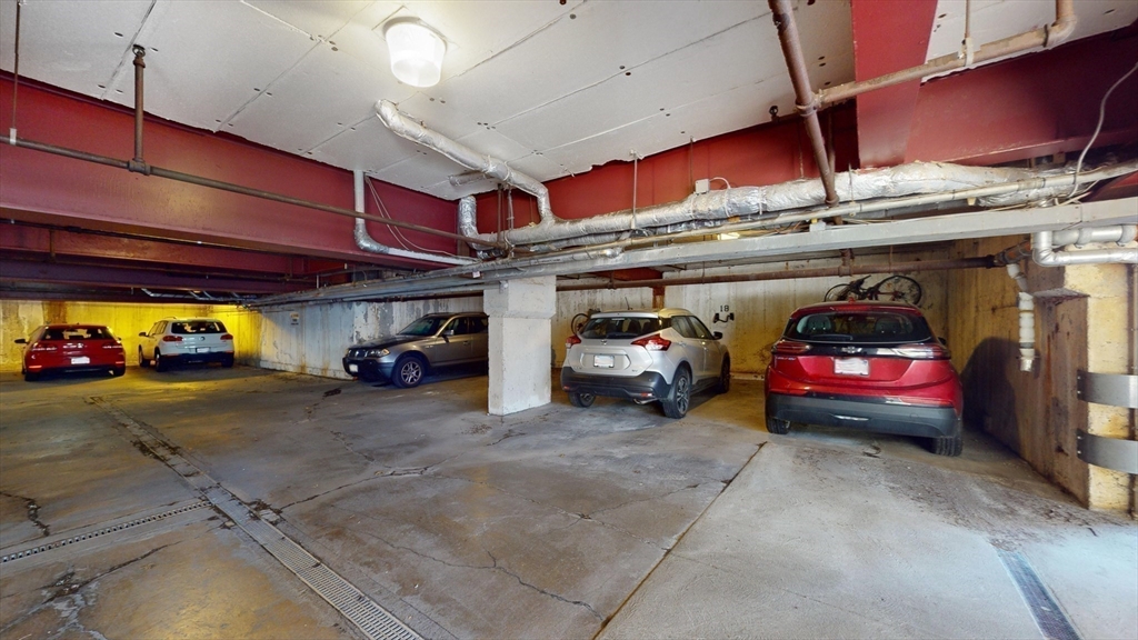 1856 Beacon Street, Unit 6F Brookline, MA 02445 - Photo 15 of 17 a car parked in garage