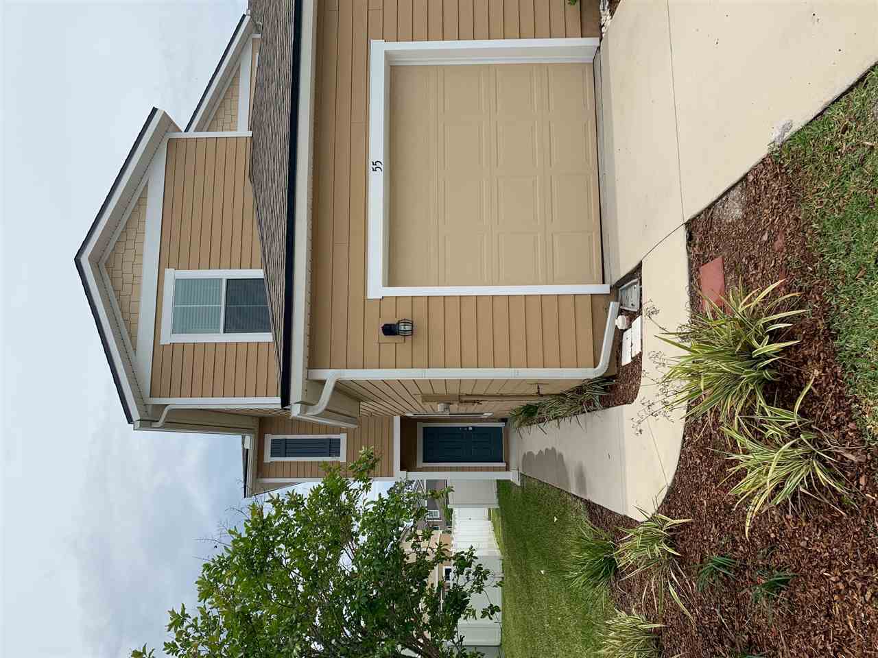 55 Buckley Court St. Augustine, FL 32086 - Photo 19 of 22 a front view of a house with a yard