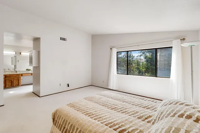 a view of a bedroom with a large bed