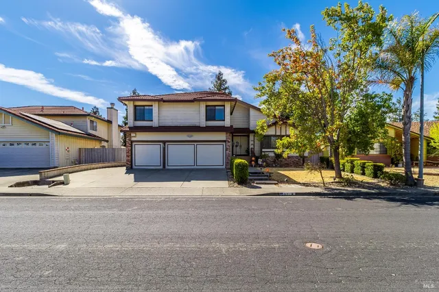 a front view of a building with a street