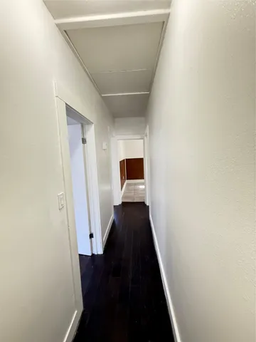 a kitchen with a stove and a refrigerator