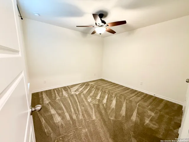 a bathroom with a double vanity sink toilet a shower and a mirror